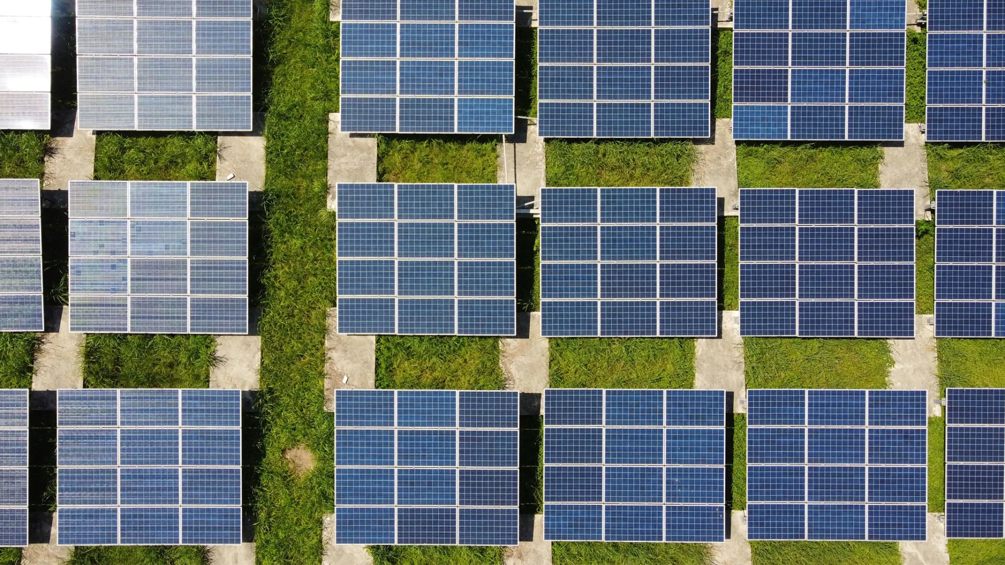 Aerial view of solar panels on a field.