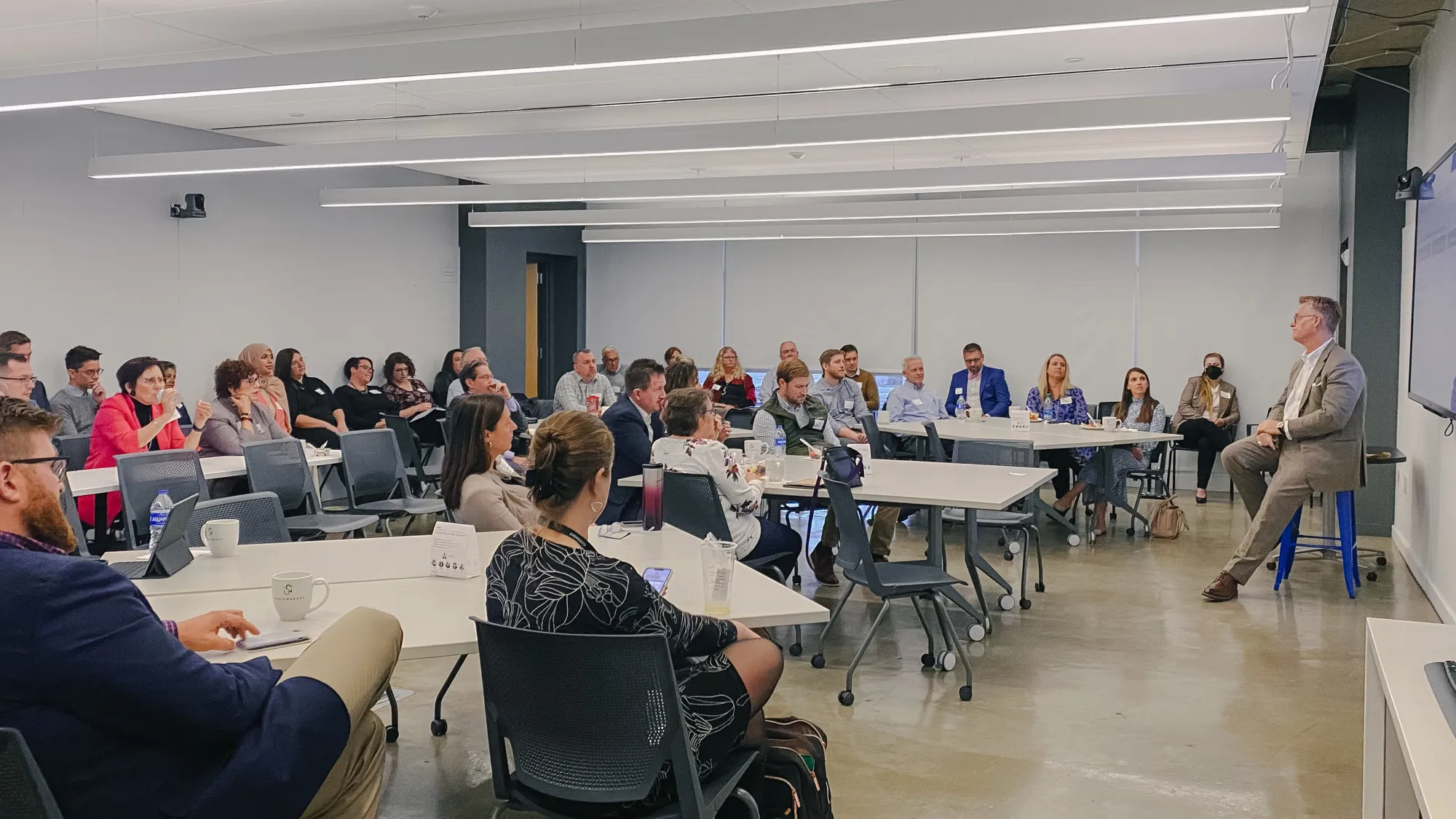Participants gathered for a presentation by the Advisory Board.