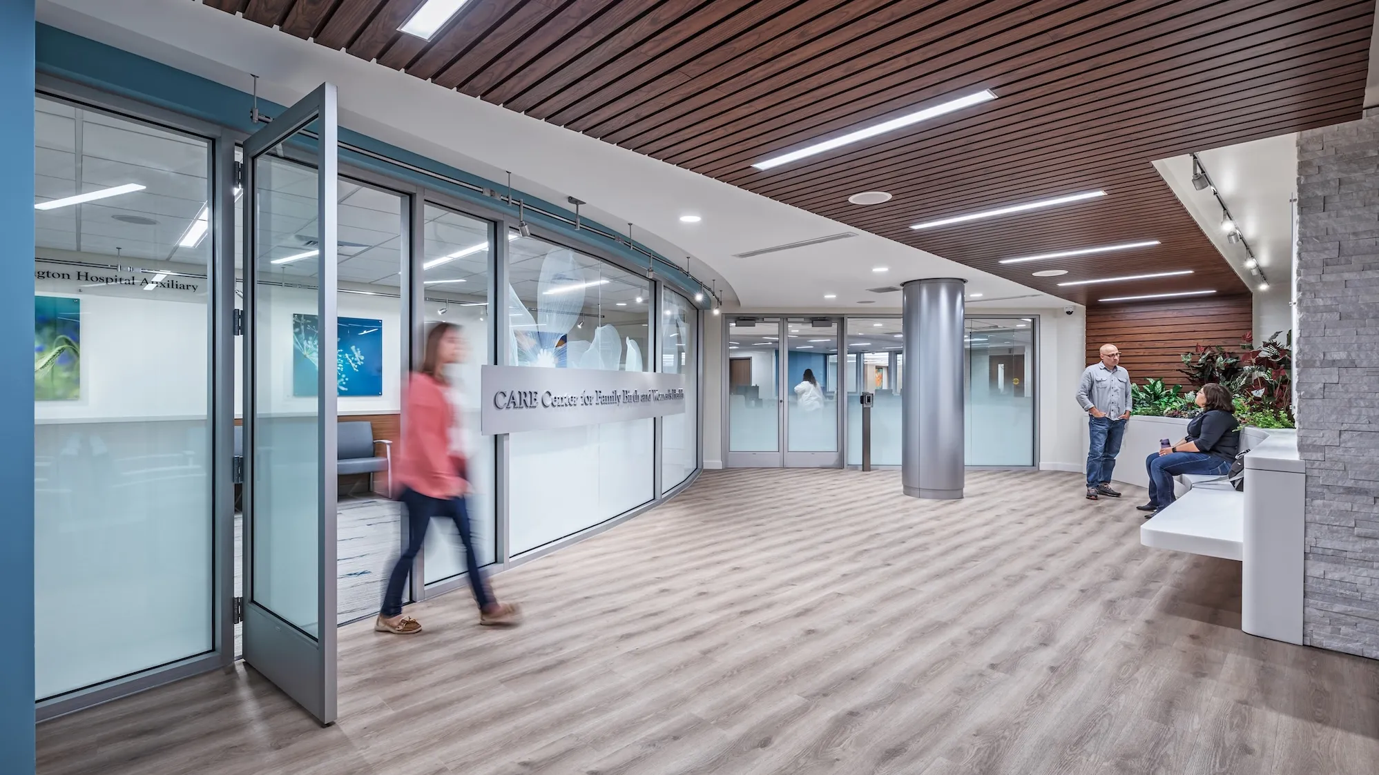 Interior lobby of Care Center for Family Birth and Women's Health, frosted windows with flower designs