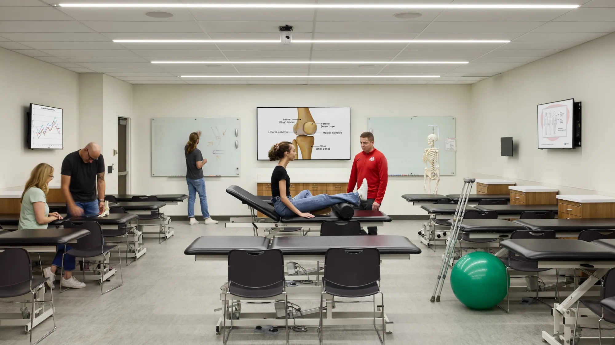 Anatomy Lab Classroom with students, teachers, and display screens