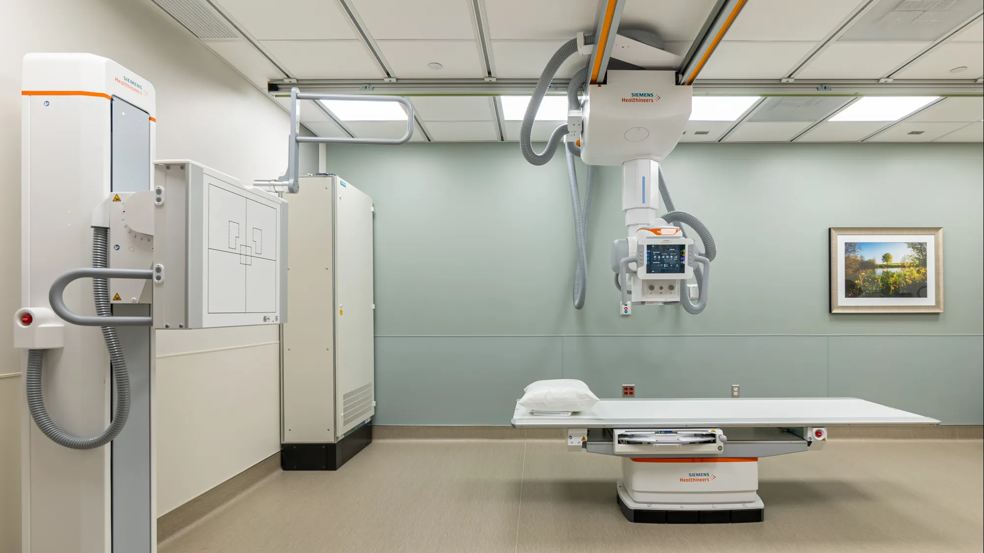 radiology equipment in neutral and light green room