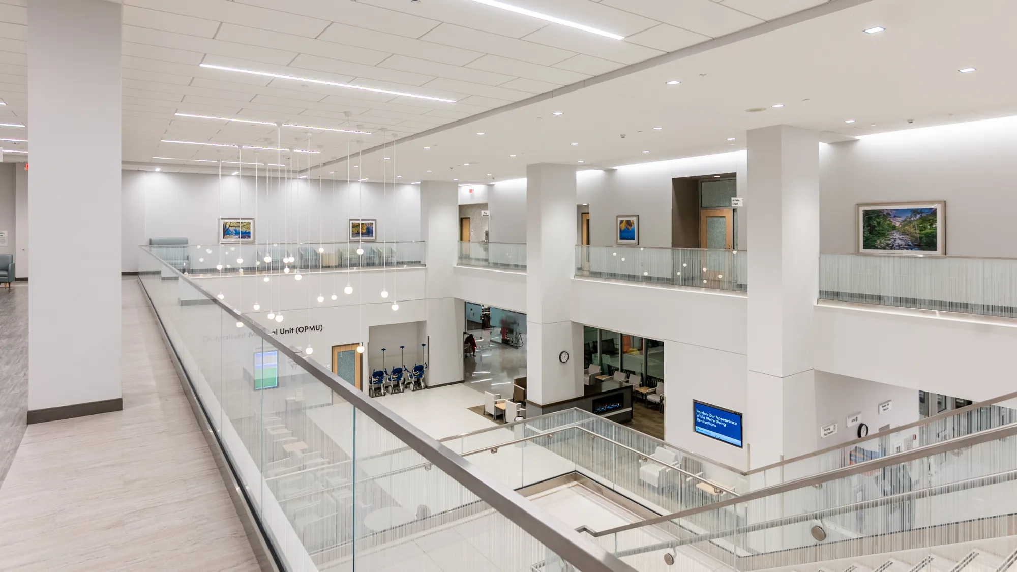 view of brightly-lit lobby from second floor