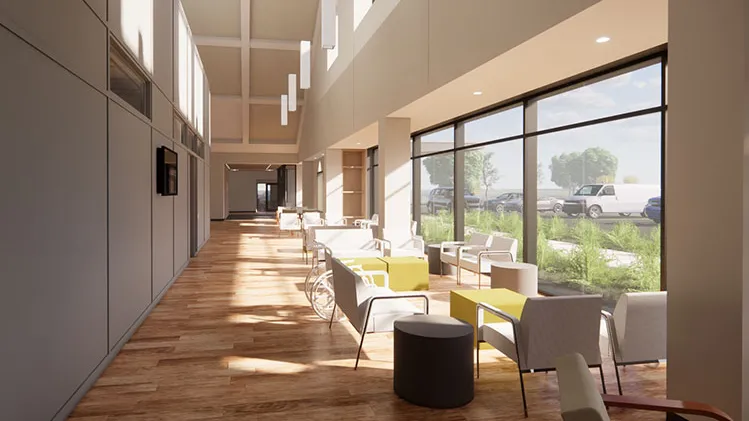 Interior day of a modern hospital lounge with light wood floors, open and airy with floor to ceiling windows