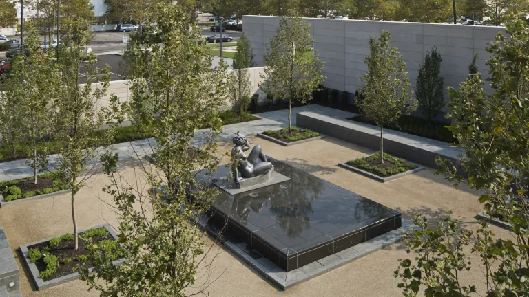 Exterior of garden outside of the Columbus Museum of Art featuring a fountain with nude statue