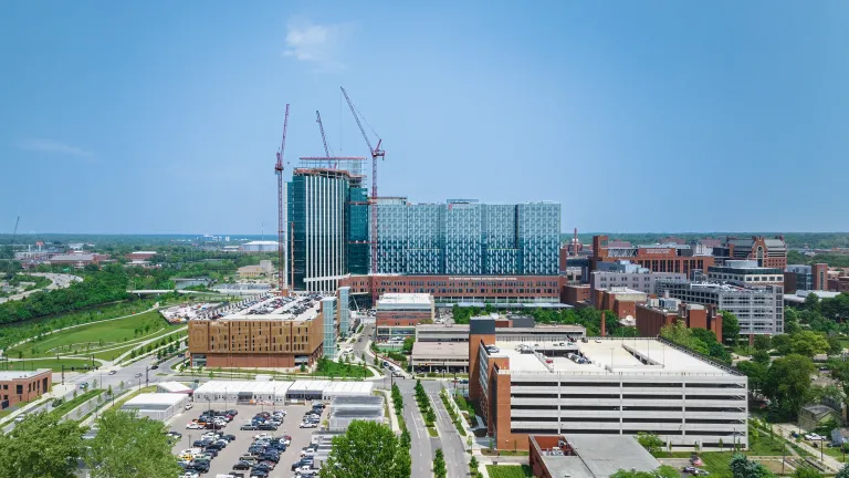 Ohio State University inpatient tower in process of construction from afar during the day