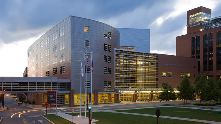 Exterior view in the evening of the The Richard M. Ross Heart Hospital at The Ohio State University Wexner Medical Center.