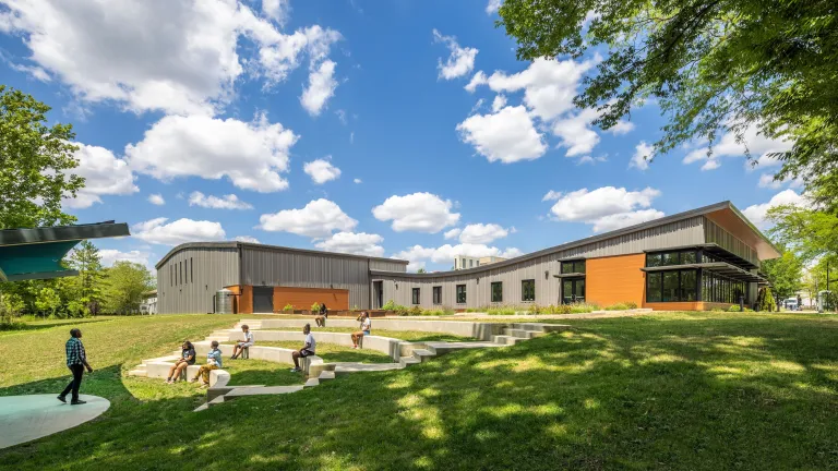 building exterior with curved roofline and amphitheater