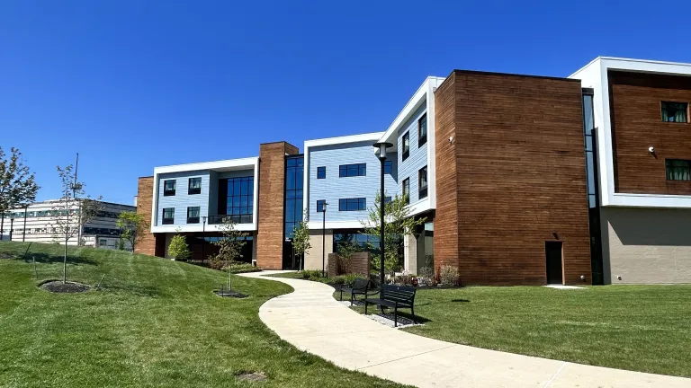 contemporary building exterior with wood paneling