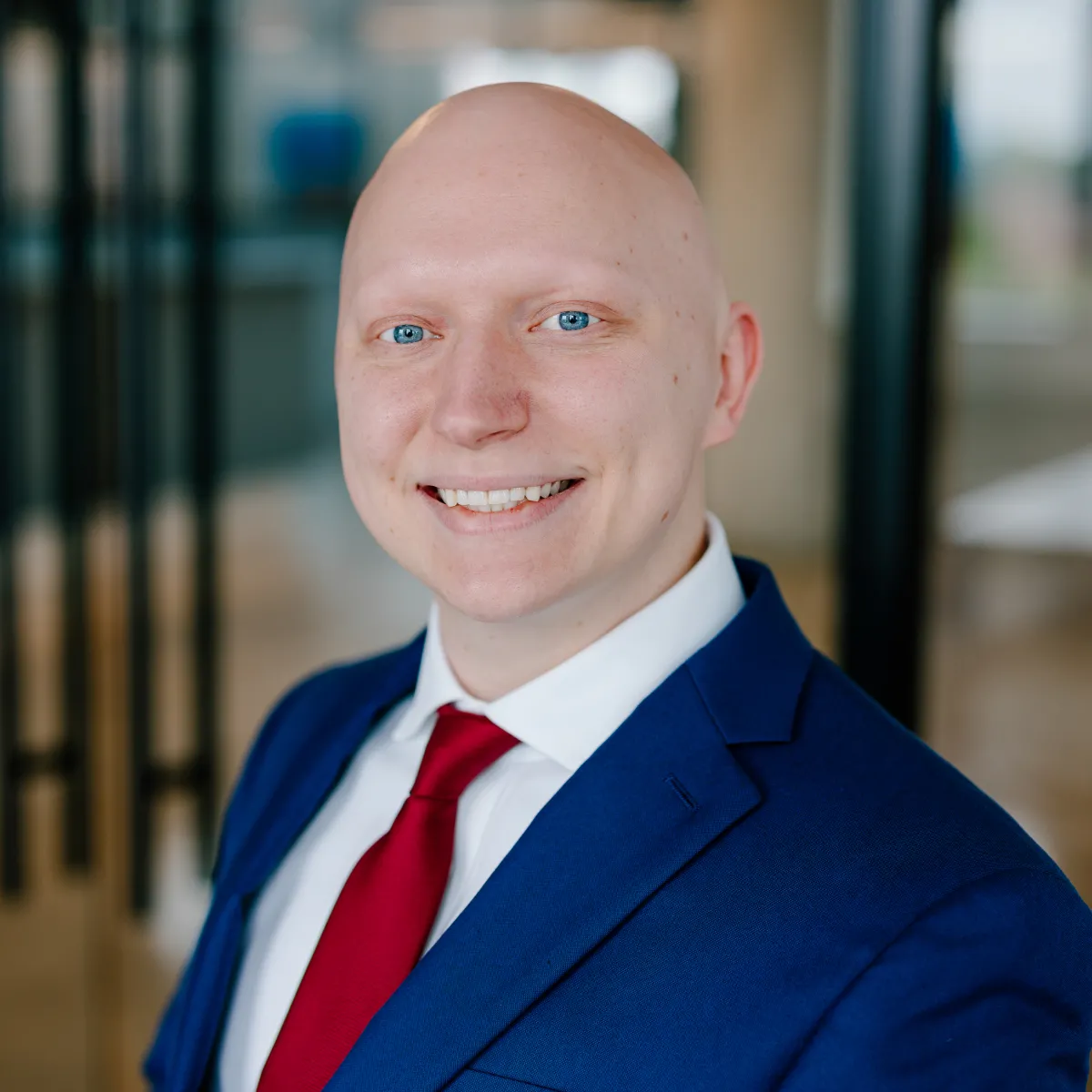 portrait photo of man in blue suit