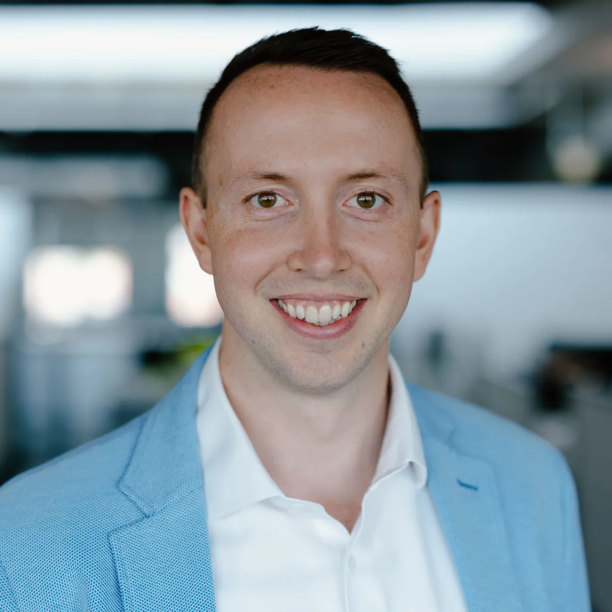 man in light blue sports coat