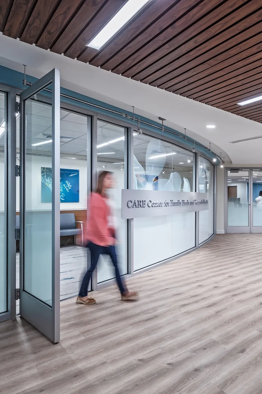 Interior lobby of Care Center for Family Birth and Women's Health, frosted windows with flower designs