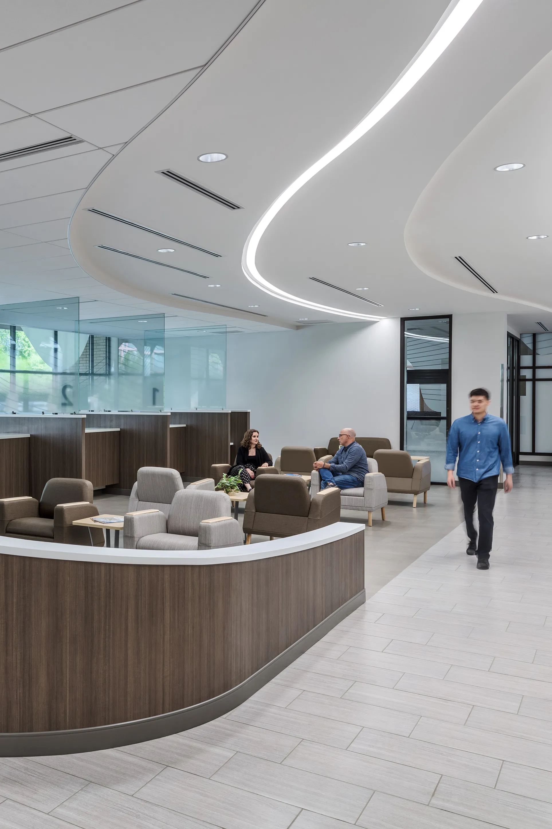 lobby with curved partition and ceiling lights