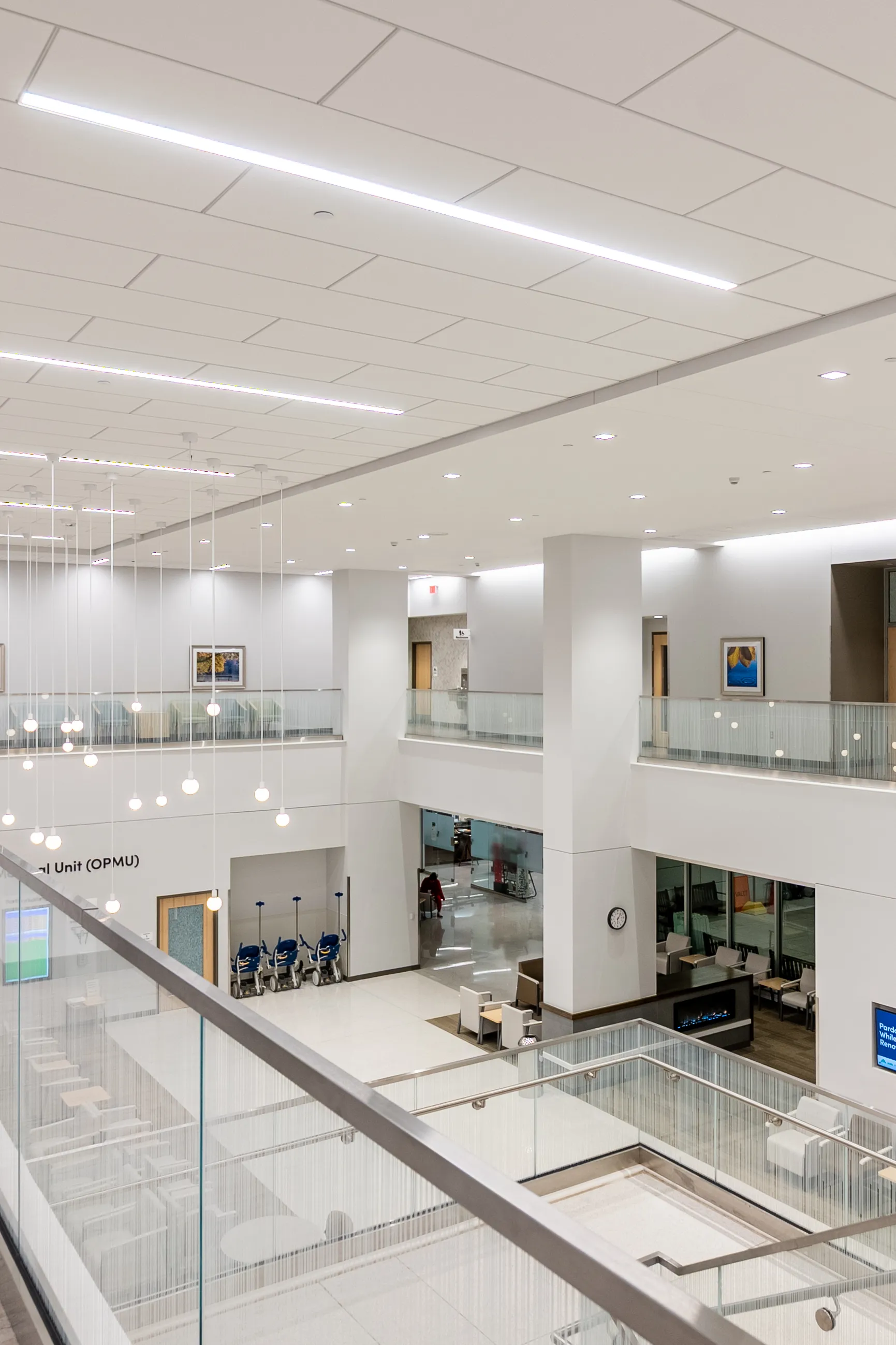 view of brightly-lit lobby from second floor