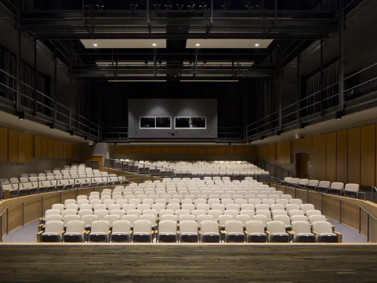 Interior of theater seats, from the view of the stage