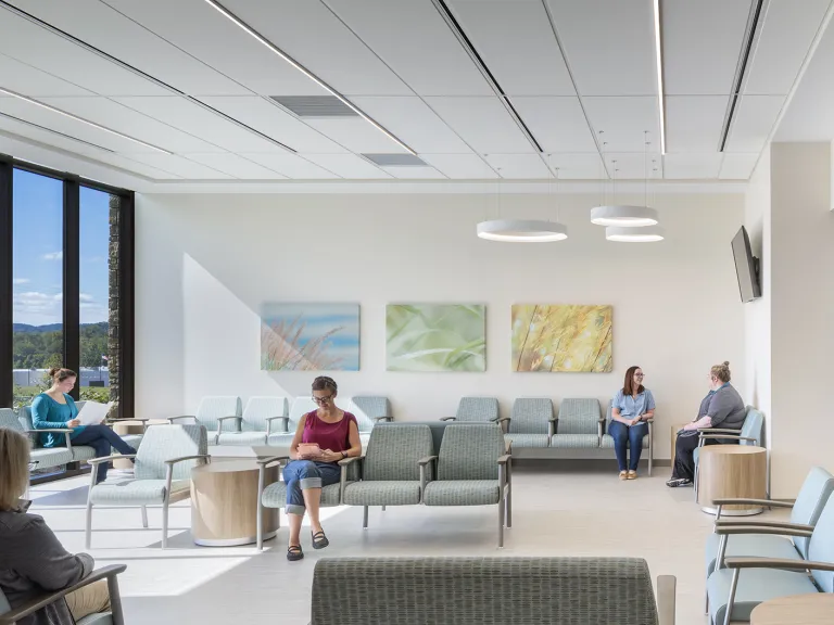 People in a waiting room in a health facility.
