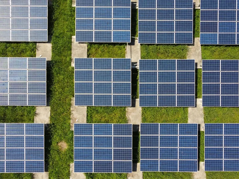 Aerial view of solar panels on a field.