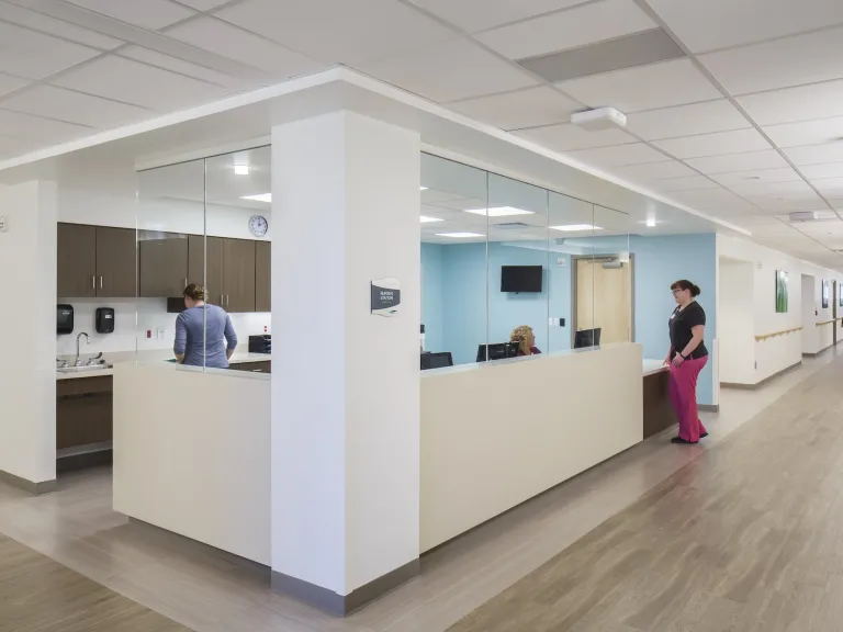 Nurse's station at Mercer's Health, white with baby blue accent walls