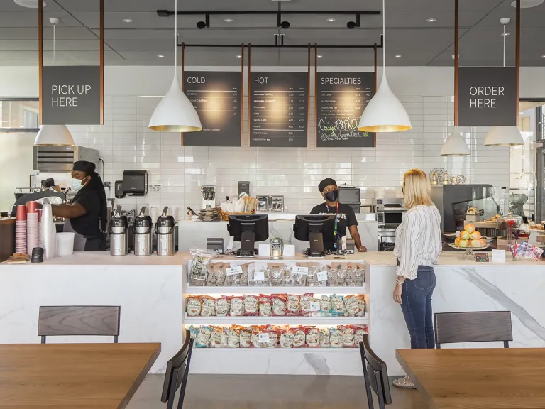 Person ordering food at a cafe in Mitchell Hall.