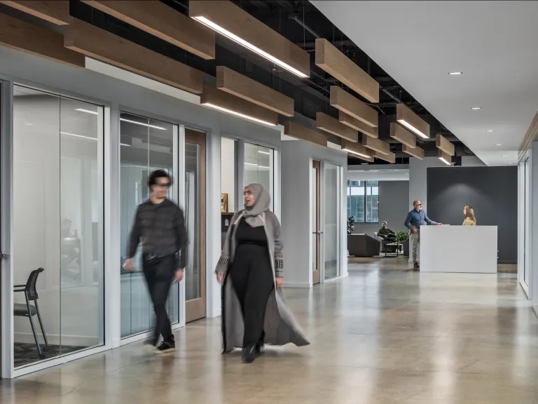 CollisionRight office corridor with sculptural ceiling lights