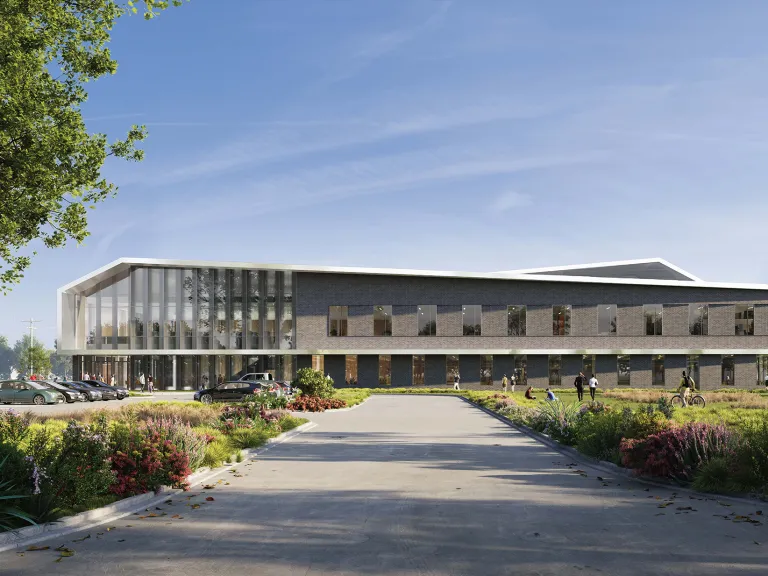 Exterior view of a research facility in the day time.