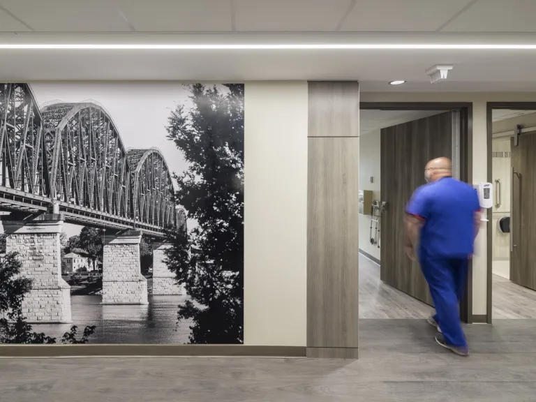 wall with floor-to-ceiling photo of a bridge