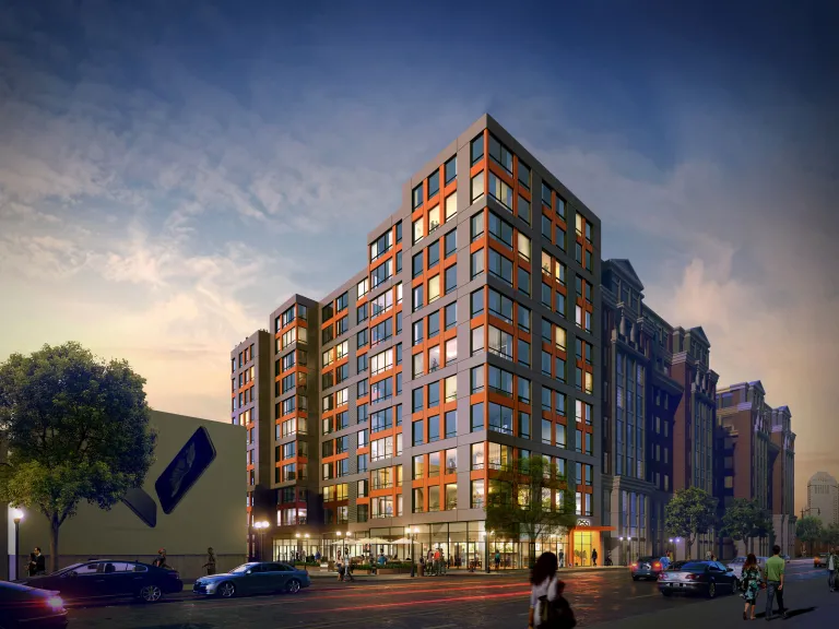 rendering of apartment building with first-floor retail