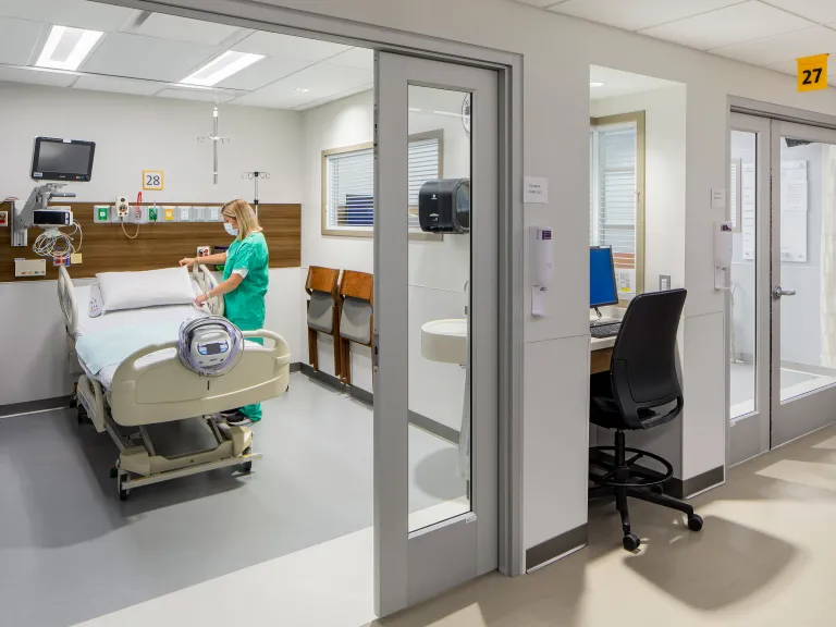 nurse prepares post operative room