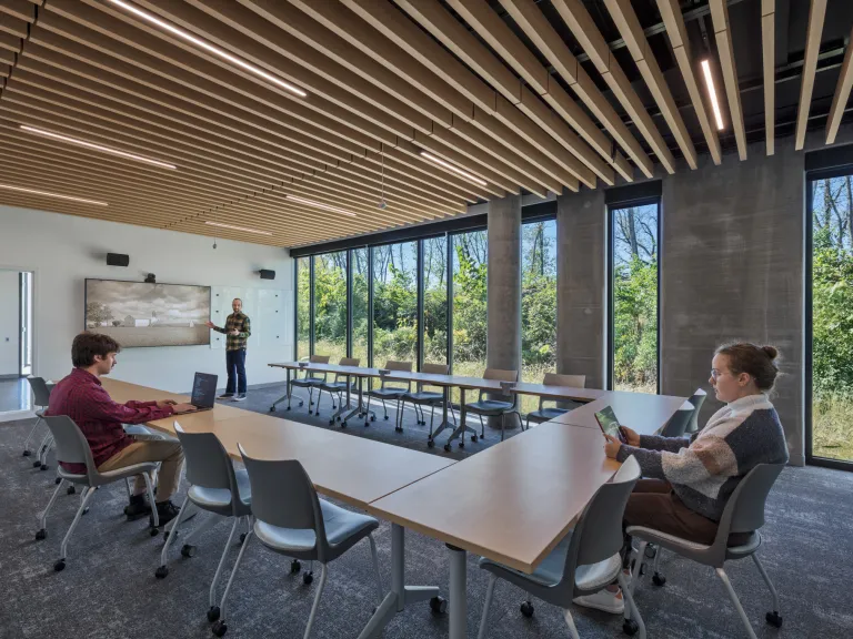conference room with wood paneled ceiling